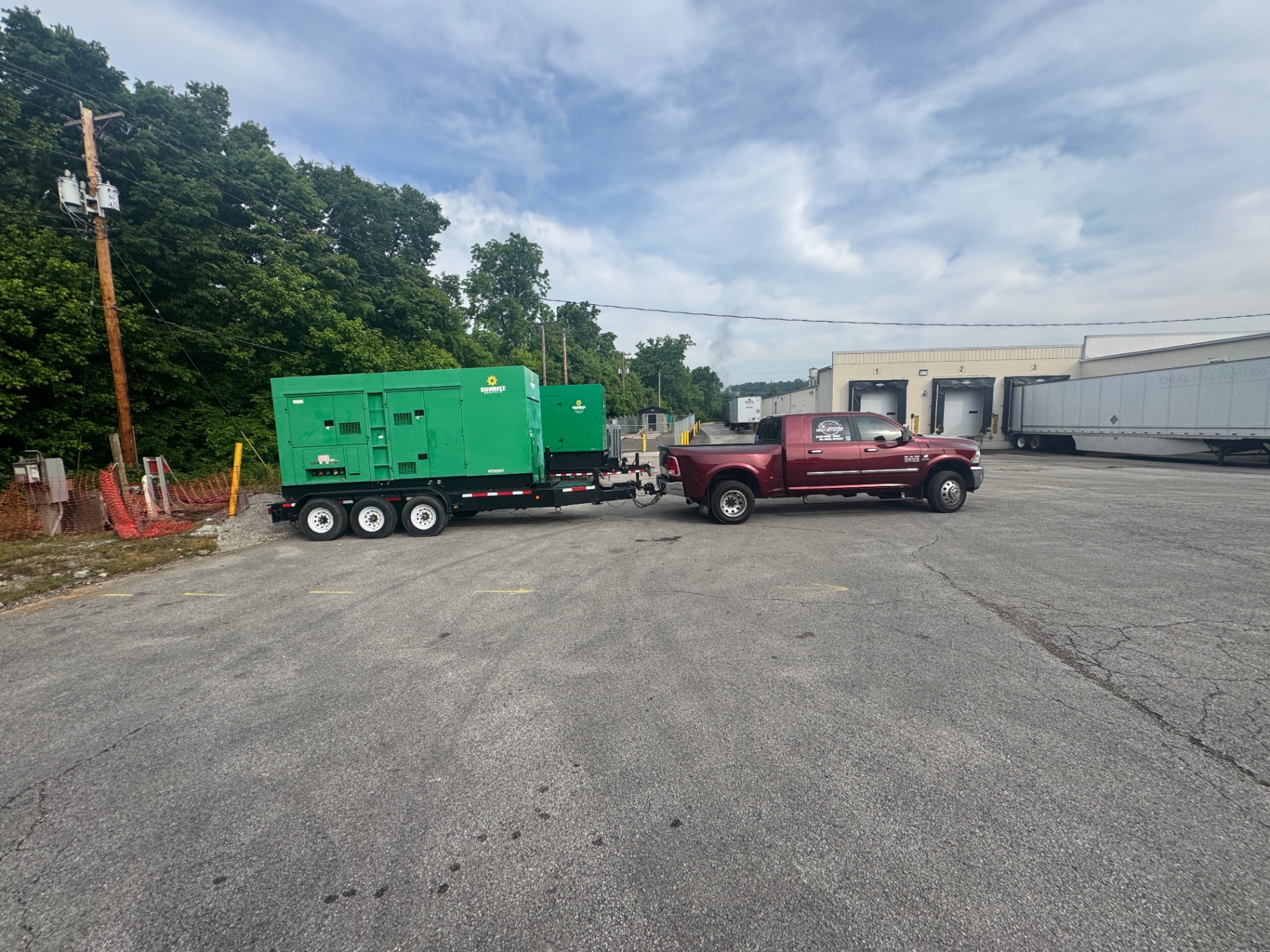 Cargo secured with heavy chains on flatbed trailer, close-up
